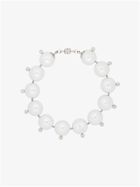 givenchy fashion brooches|Givenchy pearl necklace.